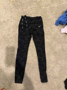 Nike Dri-Fit Women's Dri-Fit Size (S) Tight Fit Leggings Black & Grey size Small